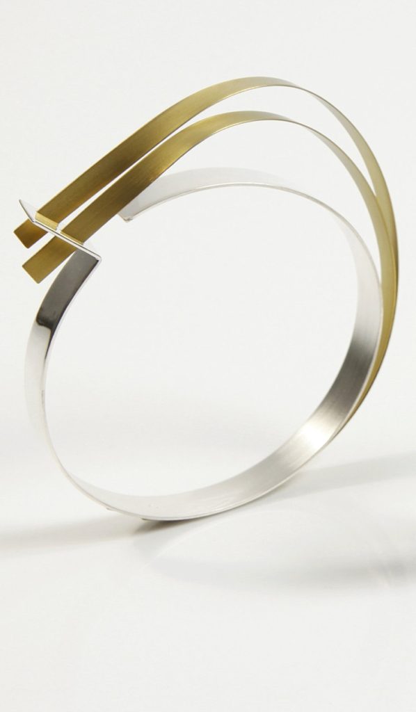 Bangle | Vanessa R Williams. Sterling silver and double anodized titanium loop