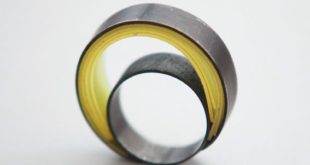 handmade ring • silver • PVC by Ioulia Kirikou