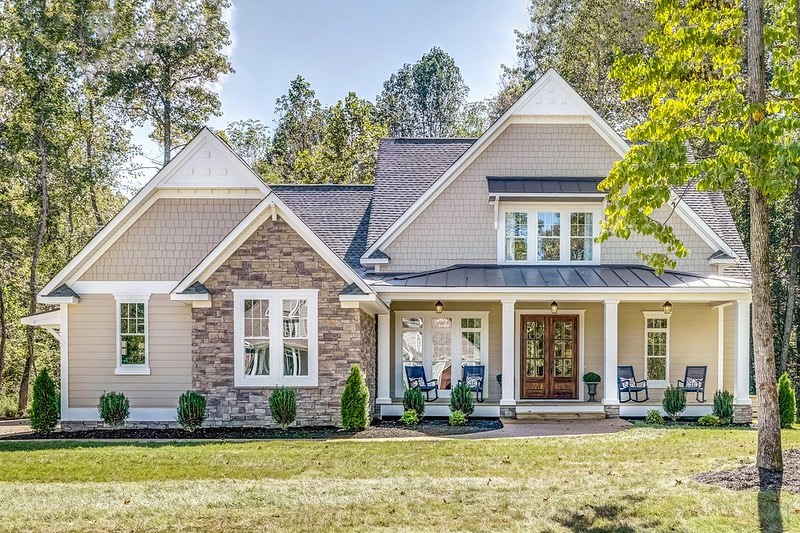 JUST STARTED! Architectural Designs Exclusive New American House plan has stunned